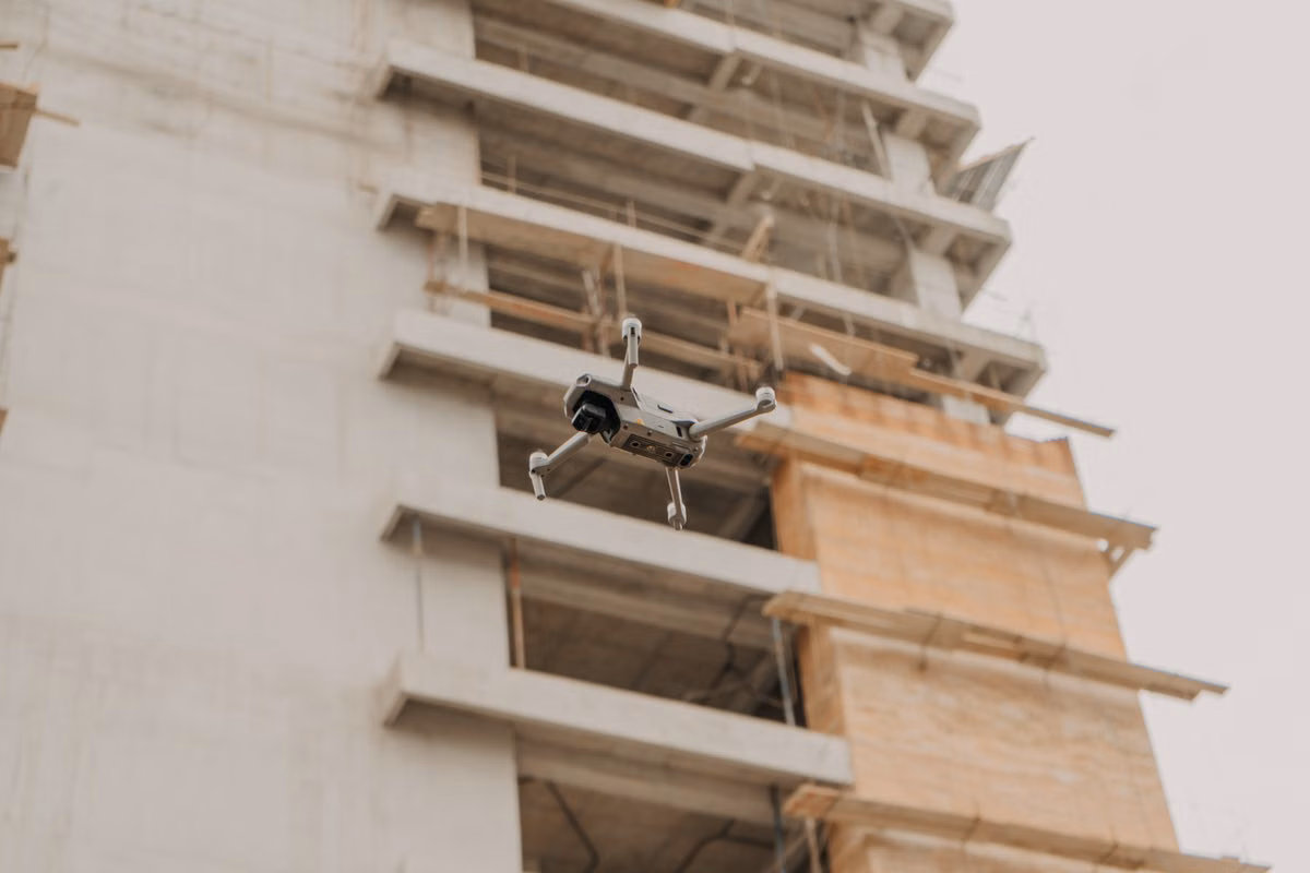 Drone flying near a building